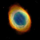 Illustration for article titled The Ring Nebula Stretches Filaments of Gas into the Darkness